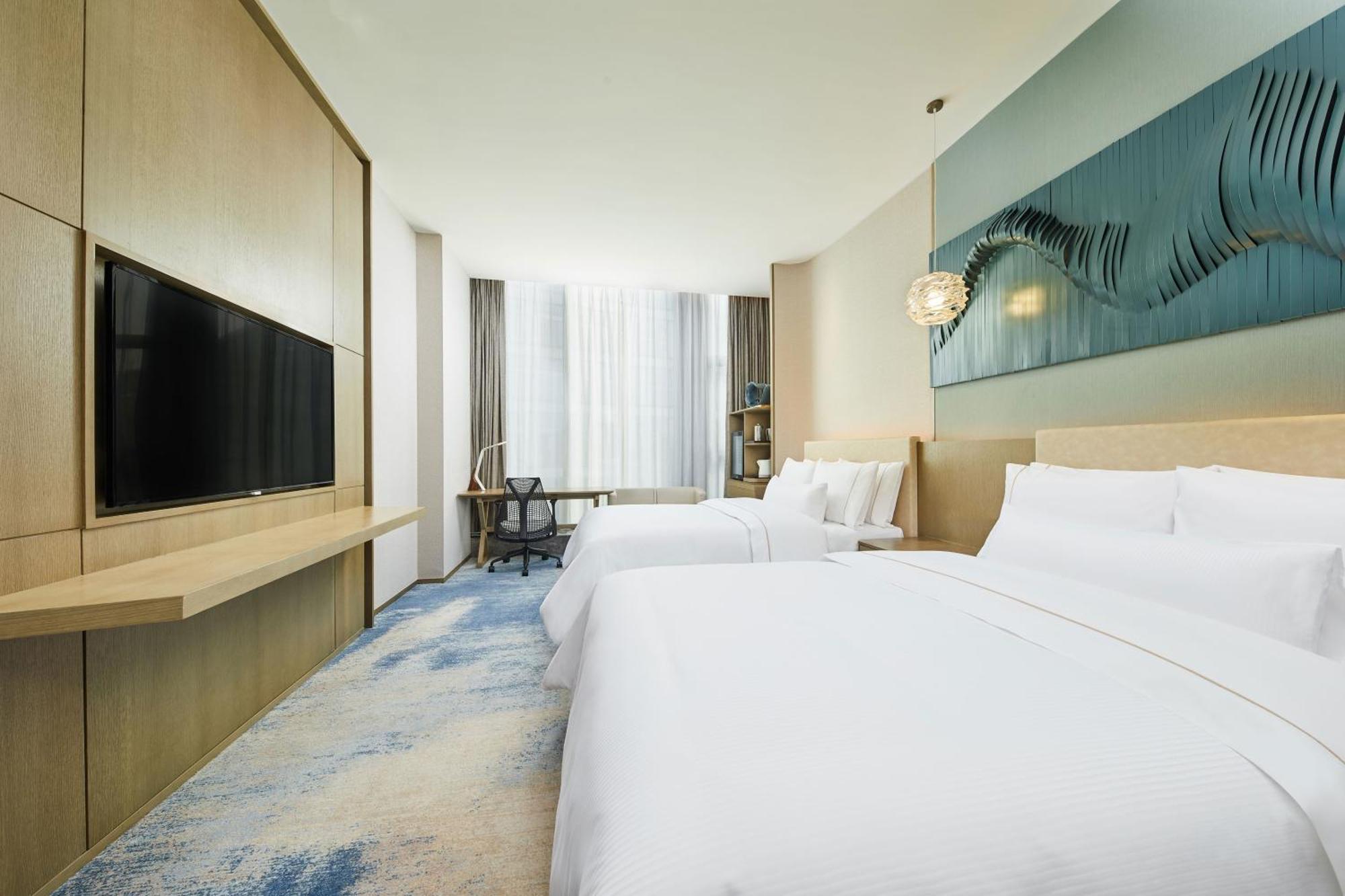 Готель The Westin Qingdao West Coast Екстер'єр фото